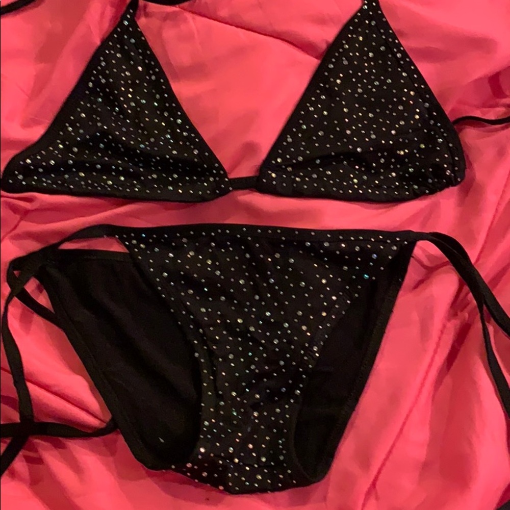 Bathing suit with small diamond looking stones.